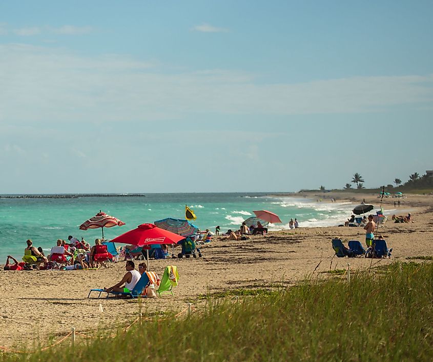 Tourists are enjoying at a beach in Stuart, Florida.