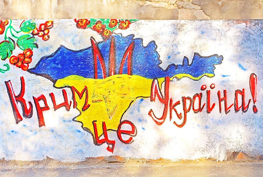 Graffiiti "Crimea is Ukraine" is against the annexation of the Crimea in Kyiv, Ukraine.