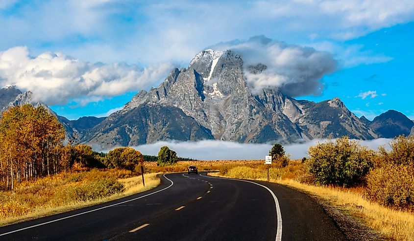 Grand Teton National Park USA Wyoming road and mountain in autumn