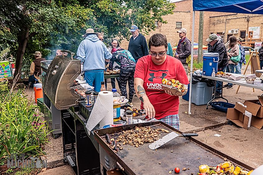 Grilling mushrooms at the Humongous Fungus Festival in Crystal Falls, Michigan.