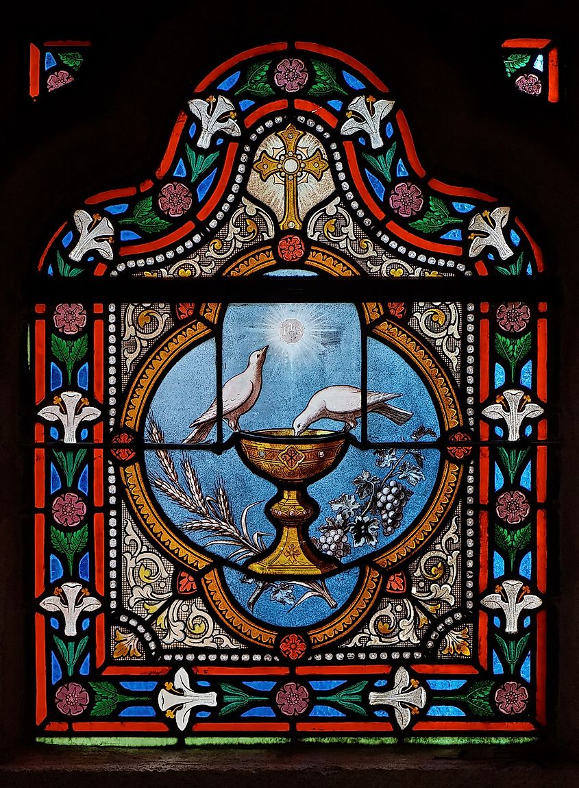The Holy Grail depicted on a stained glass window at Quimper Cathedral