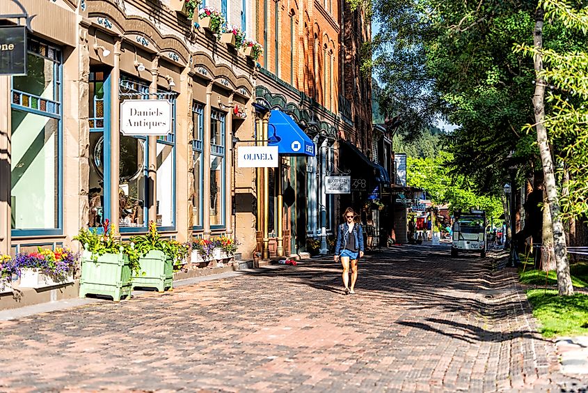 Aspen, town in Colorado with pedestrian mall in luxury expensive famous city during summer day.