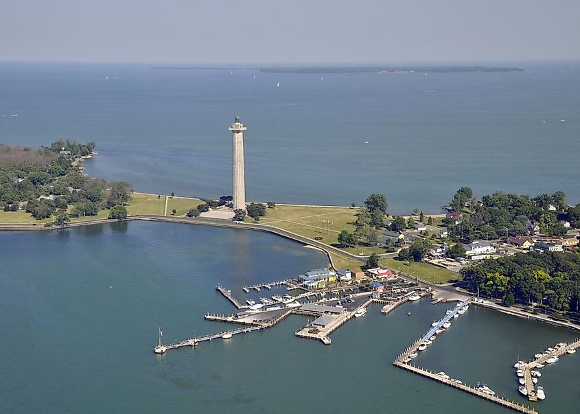 Aerial view of Put in Bay's marina and Perry's Victory & International Peace Memorial, via 