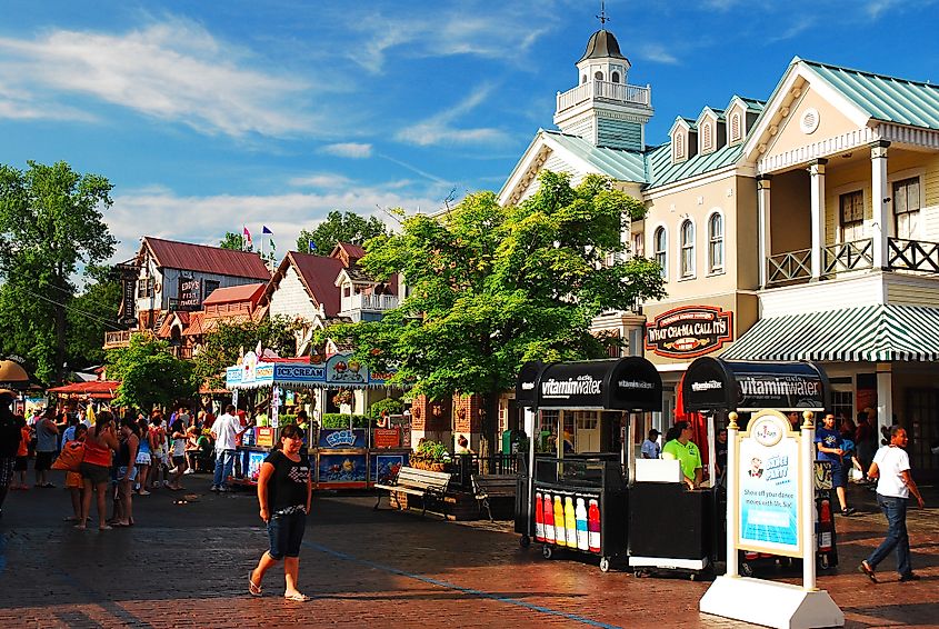 A crowd of people congregate at a recreated New England village in Agawam, Massachusetts