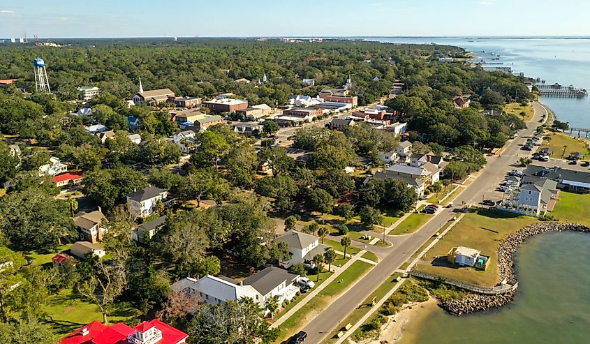 Aerial view of Southport, North Carolina with view of restaurants and waterfront.