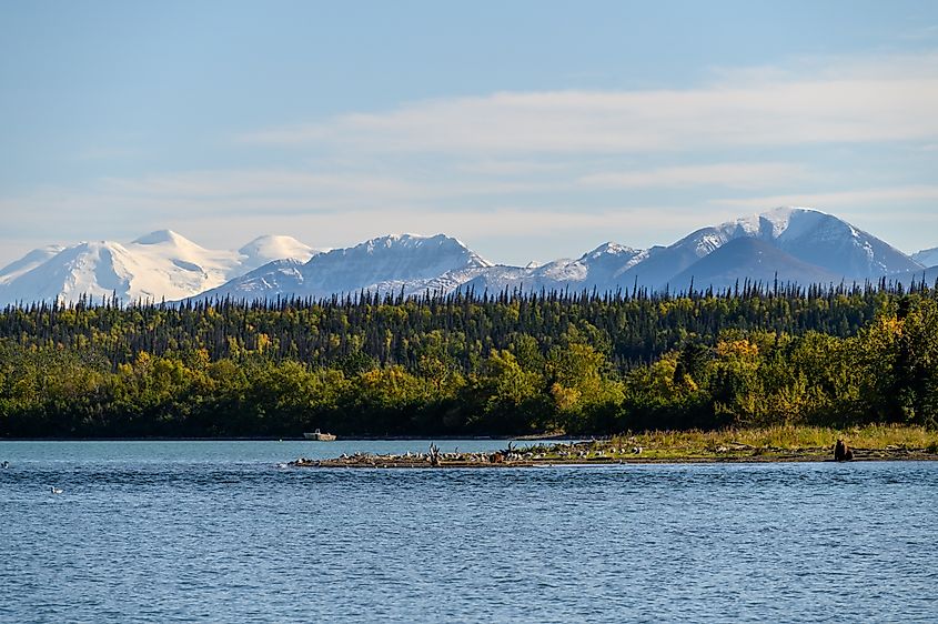 Sunrise over Naknek lake with brown bears on the sand spit, Katmai National Park, Alaska