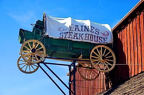 Covered-wagon sign at the Haines Steak House.