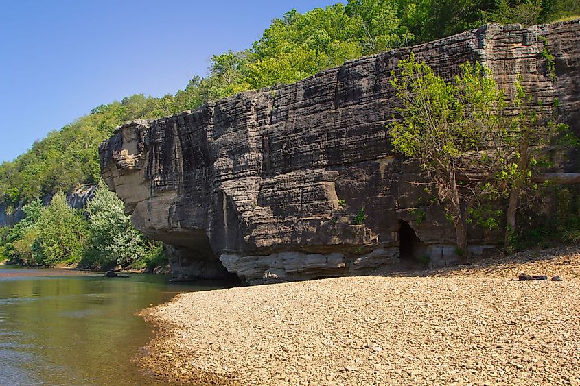 A crag overhanging the riverbank of the scenic Buffalo River in Arkansas.