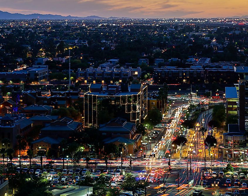 Downtown Tempe traffic on Mill Avenue at night. 