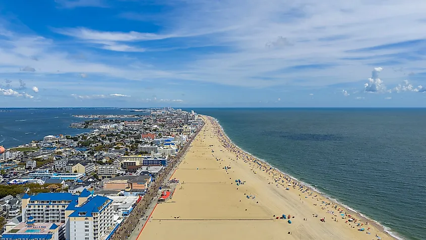 Ocean City Maryland USA - 8 30 2025: Aerial shot of hotels and condos along the coast of the Atlantic ocean in Ocean City Maryland USA. Via Shutterstock / Marcus E Jones