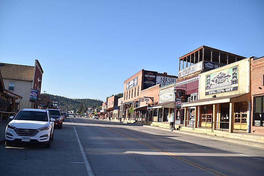 Lively street lined with shops in Hill City, South Dakota.