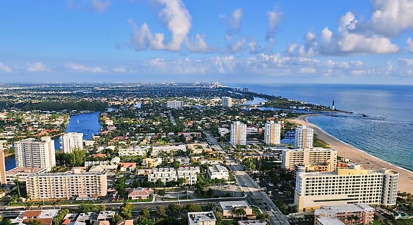 Aerial view of Atlantic Intracoastal Waterway and Ocean at Pompano Beach, Florida, with Hillsboro Inlet and Lighthouse