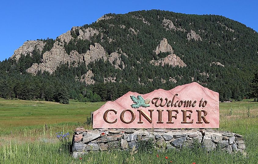 The "Welcome to Conifer" sign located on U.S. Route 285 in Jefferson County,, Colorado.