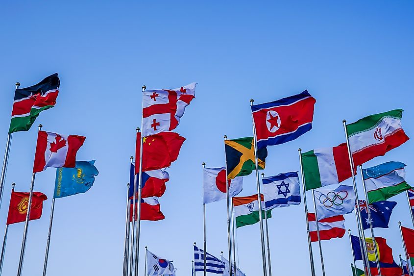 Flags of the world in the 2018 Winter Olympic Games Athletes Olympic Village in PyeongChang, South Korea. Editorial credit: Leonard Zhukovsky / Shutterstock.com