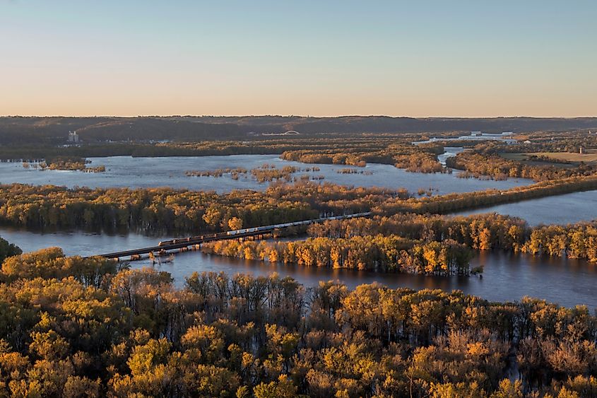 A freight train passing through Wylausing State Park in southern Wisconsin, where the Wisconsin River flows into the Mississippi River.