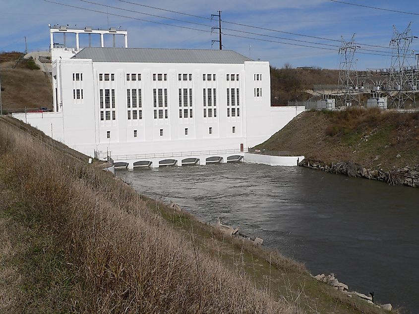 Powerhouse and tailrace canal at hydroelectric plant on the Loup Canal, near Columbus, Nebraska