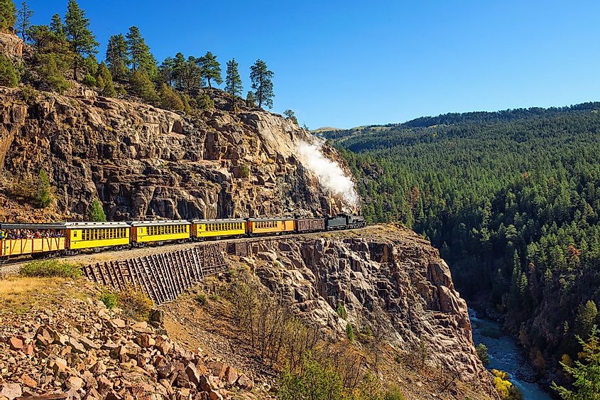 Historic steam engine train travels from Durango to Silverton through the San Juan Mountains in Colorado. 