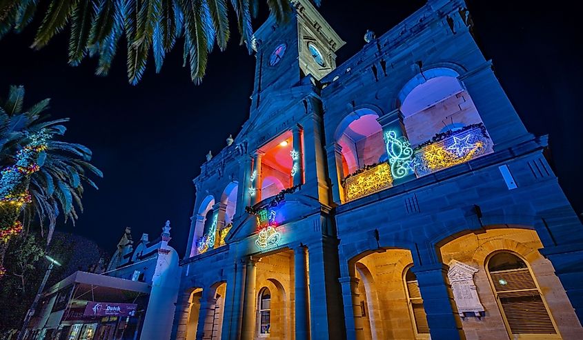 Town Hall illuminated at night with Christmas decorations