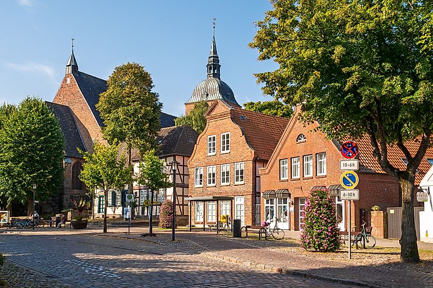 Street scene in the old town of Burg on Fehmarn Island, Schleswig-Holstein, with Saint Nicholas Church and the Fehmarn Museum