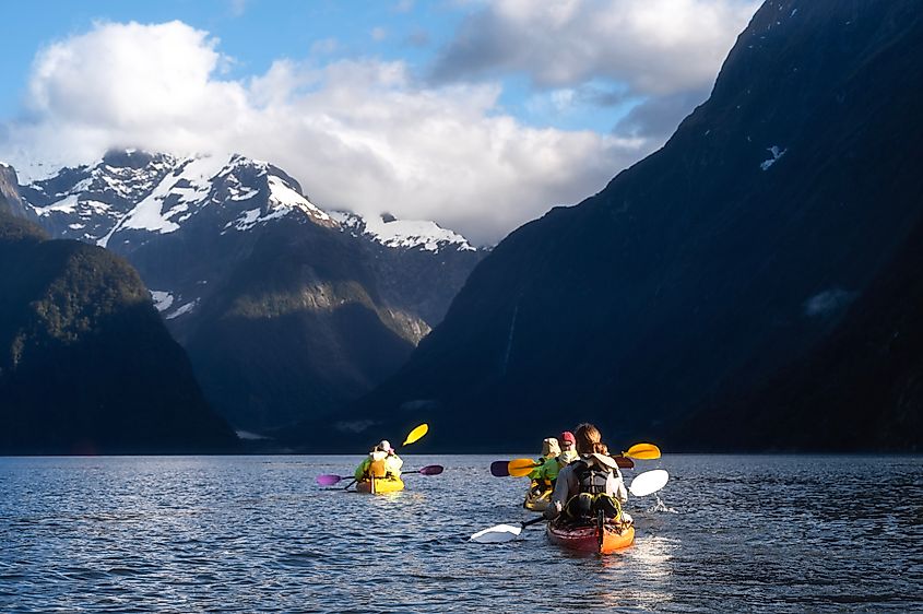 Kayaking in the Milford Sound, Fiordland National Park, South Island, New Zealand.