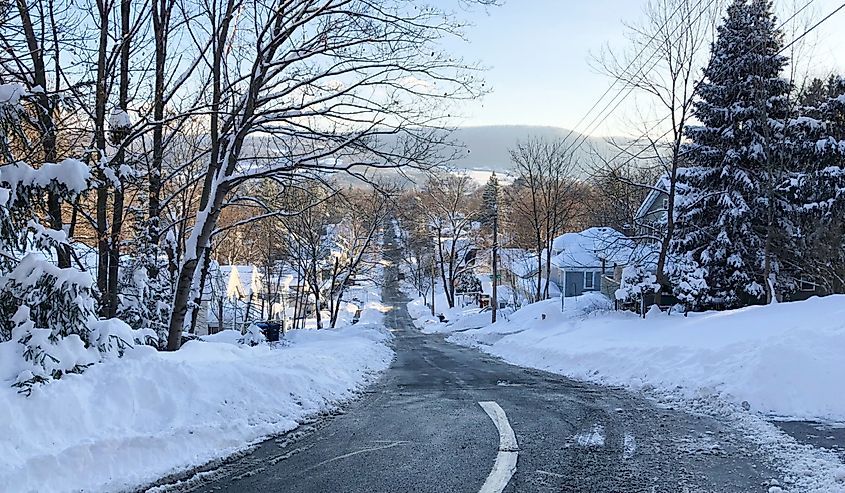 Snow covered city of Oneonta, New York street