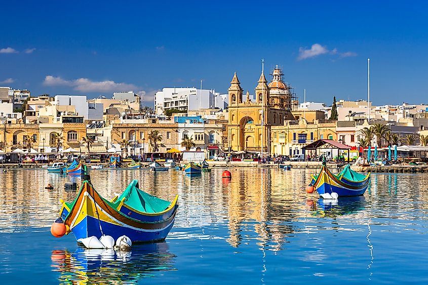 Traditional fishing boats in the Mediterranean Village of Marsaxlokk, Malta.