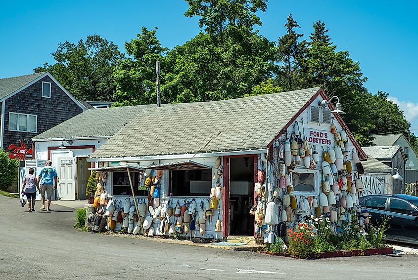 Lobster restaurant with colorful fishing net floats hanging on the wall in Noank, Connecticut.