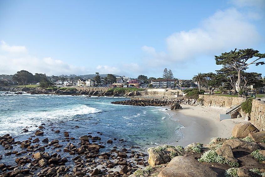 View of Lovers Point beach and cove, with the Pacific Grove neighborhood in the distance