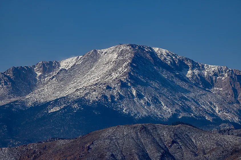 Low snowpack is visible on the Front Range mountains