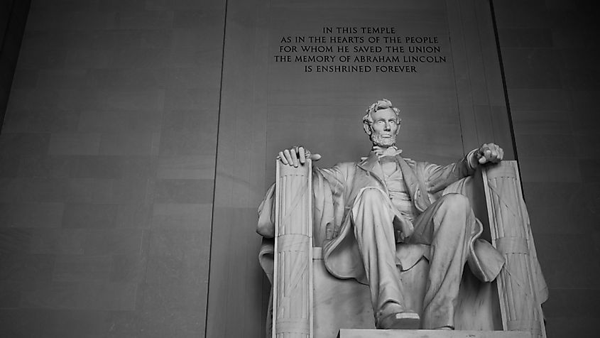 The seated statue of Abraham Lincoln inside the Lincoln Memorial.