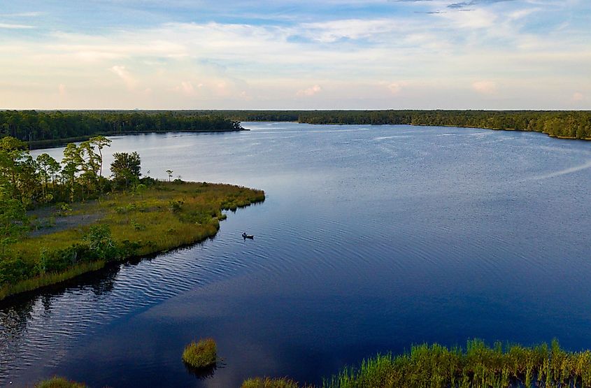 Lone fisherman at Basin Bayou in Freeport, Florida.