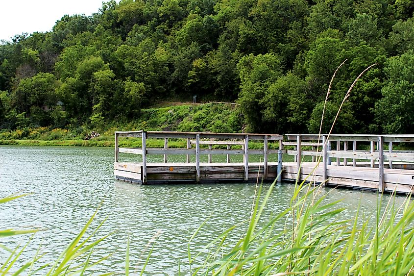 The pier at Bass Pond in scenic Lanesboro, Minnesota. Image credit: Lanesboro Arts via Wikimedia Commons.