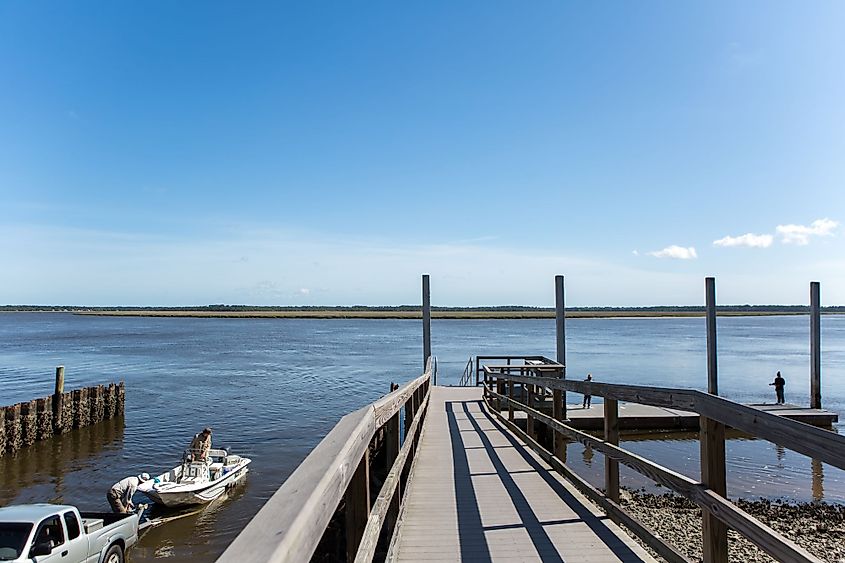 Fisherman on dock in Crooked River State Park, St. Marys, Georgia