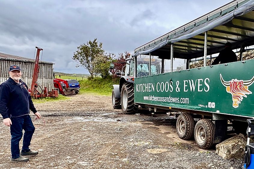 Neale McQuistin and tractor and trailer Image credit Bryan Dearsley