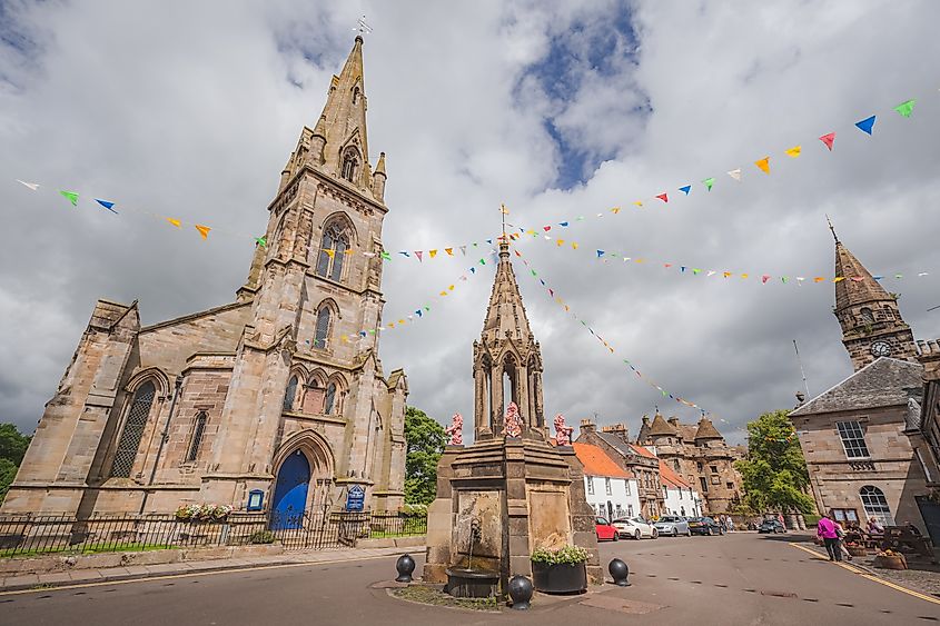 The Bruce Fountain and Falkaland Parish Church in Falkland, Scotland
