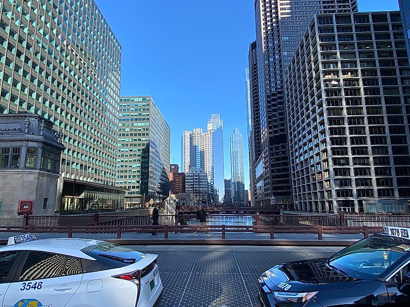 The tall buildings and river bridges of downtown Chicago. 