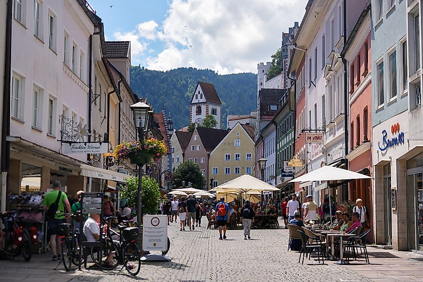 View of people in downtown Fussen, Germany.