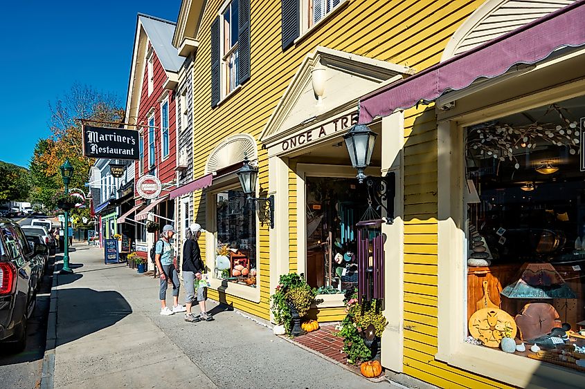 Women window shop in downtown Camden, Maine