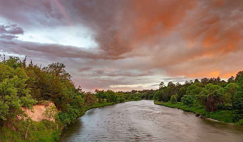 Colorful sunrise clouds over the Niobrara River near Valentine, Nebraska