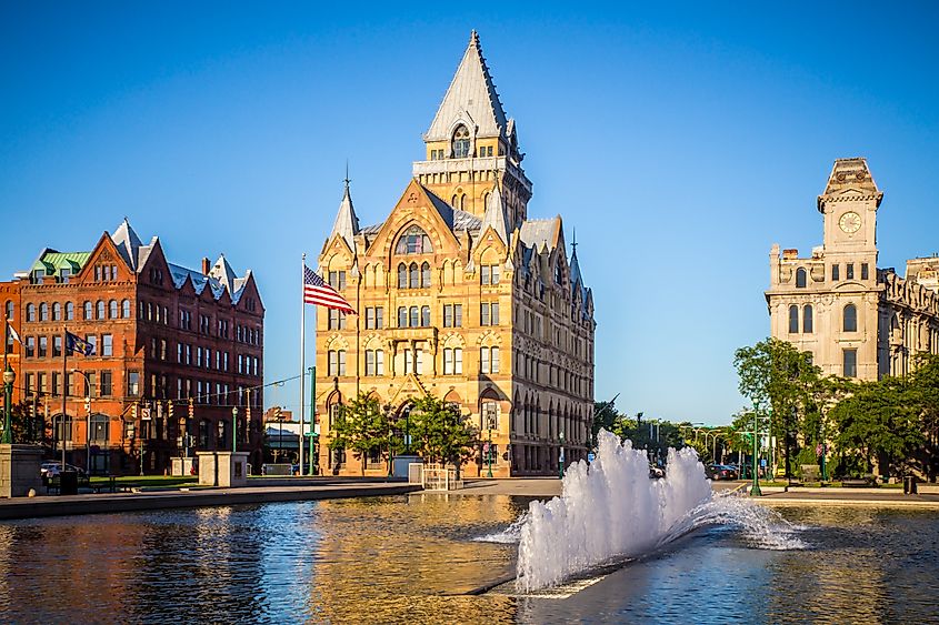 Downtown Syracuse New York with view of historic buildings and fountain at Clinton Square