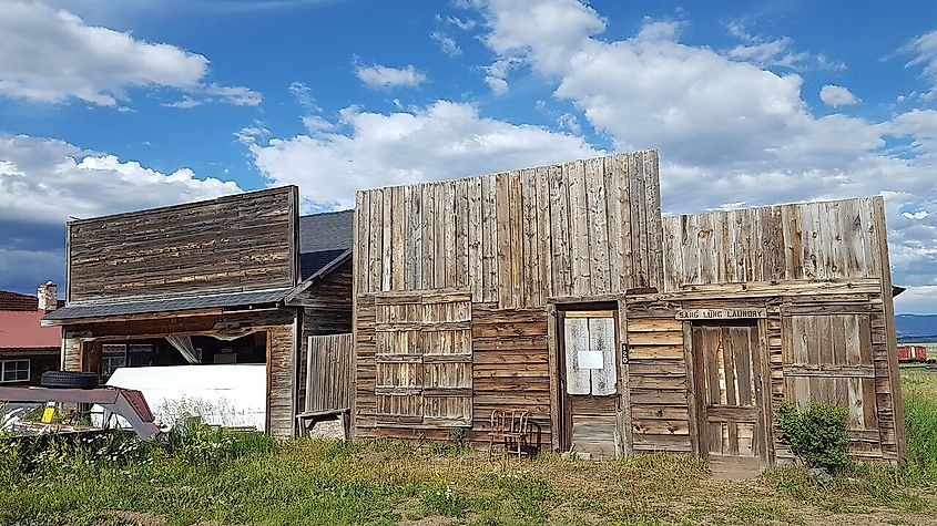 Remains of old wooden buildings at the town of Como, Colorado.