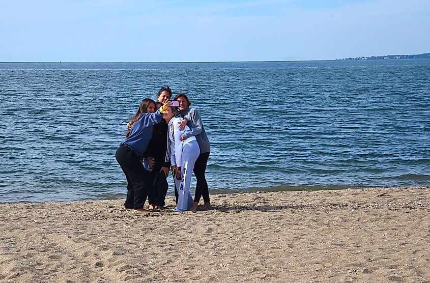 A group of girls take a selfie at Hammonasset Beach State Park in Madison, Connecticut