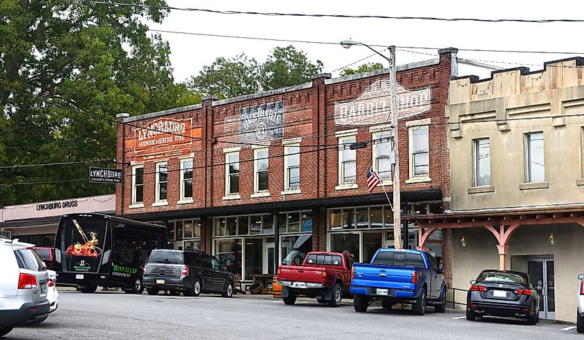 Drug store, Lynchburg Hardware and General Store, Jack Daniels and Barrel shop in the traditional commercial block close to the Jack Daniels Distillery.