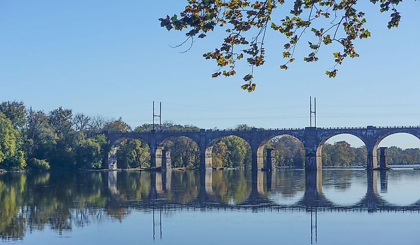 A stone bridge spans the Delaware River near Yardley, Pennsylvania.