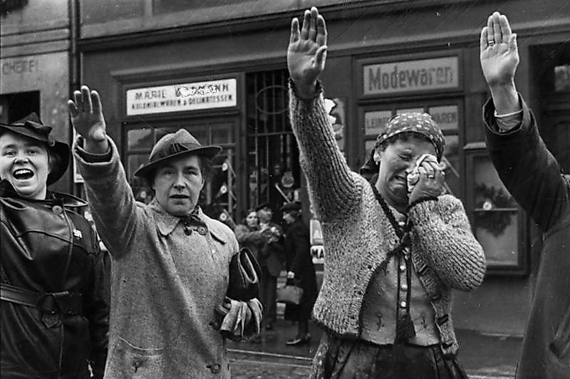 Ethnic Germans in the city of Eger (now Cheb) greeting Hitler with the Nazi salute after he crossed the border into the formerly-Czechoslovak Sudetenland on 3 October 1938