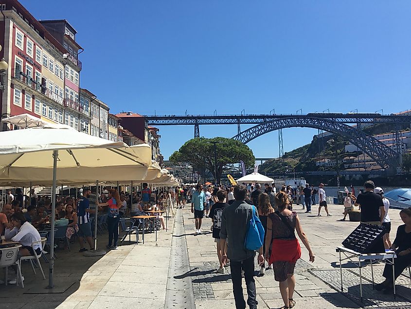 A bustling, sunny day on the waterfront in Port, Portugal