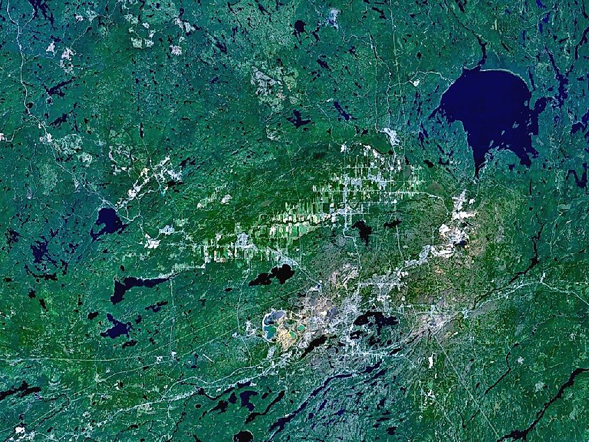 The Sudbury and Wanapitei impact craters in Ontario, Canada. Sudbury is the large, elliptical structure. Wanapitei is the lake filled crater at upper right.