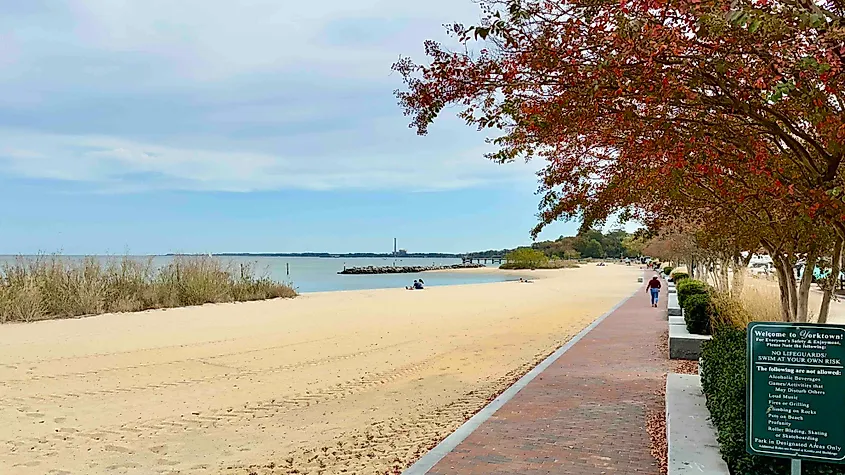Yorktown Fall Colors and people on beach photo Bryan Dearsley