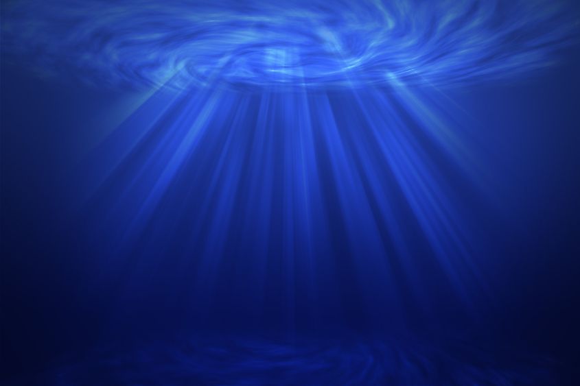 The dark deep-sea zone, where cold water persists far below a warm surface.