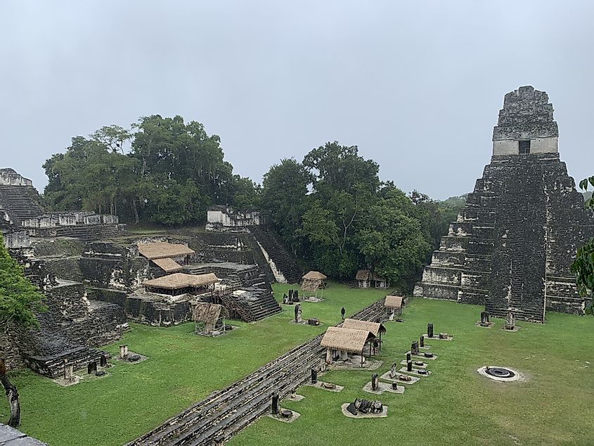 The megalithic temples and main courtyard at the Mayan city of Tikal. 